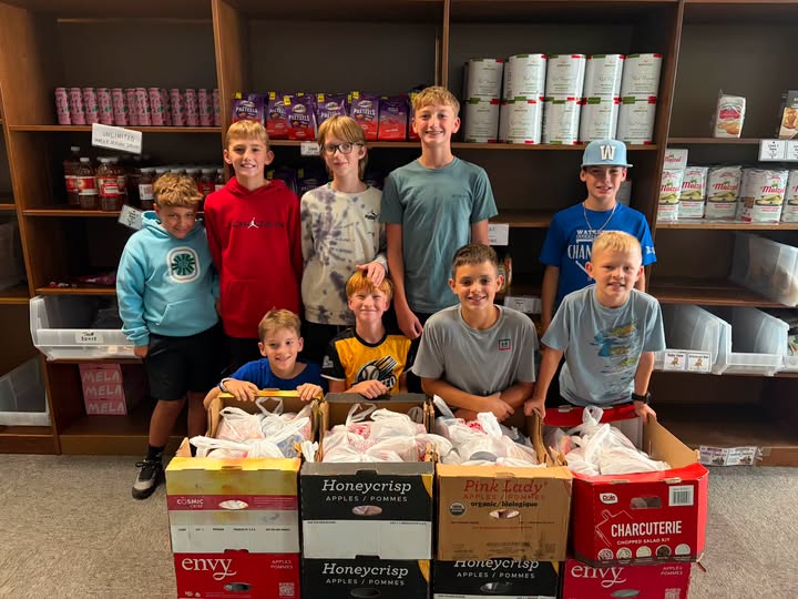 Children making snack packs